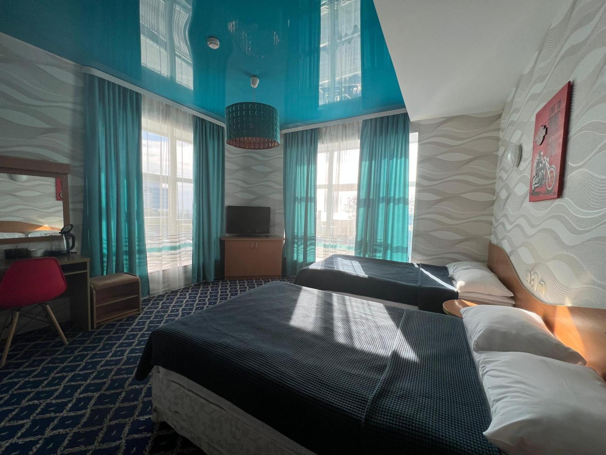 Three Dolphins Hotel Aktau  Exterior foto